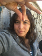 collage brunette brown_eyes hand face dangle between_fingers looking_at_tiny peque