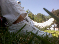 collage micro small_man climbing unaware grass sneakers photograph point_of_view trees peque