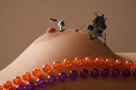 breasts nipples shrunken beads astronaut flag space_ship landing