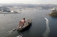 giantess collage swimsuit barefoot ocean buildings sunglasses ships aircraft_carrier sunbathing harbor downward_angle flight_deck giulio_10