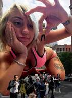 giantess collage city blonde cleavage lying_down running people streets dangle tattoo between_fingers looking_at_tiny giantess_jazmini
