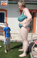collage small_man size_difference barefoot bbw legs amazon grass squeezemeflat looking_at_tiny