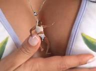 collage shrunken_men shrunken_man manicure necklace hanging_on source_needed between_breasts