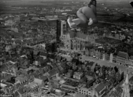 collage city monochrome barefoot buildings unknown_artist crawling looking_at_viewer downward_angle