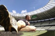 collage giant stadium unaware clouds looking_up sky running_shoe