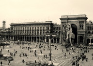 breasts giantess collage city blonde monochrome cleavage buildings stockings smiling crawling vehicles looking_at_viewer crowds italy mini_skirt pigeons zed782 plaza milano