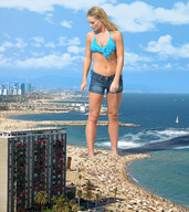 collage blonde long_hair swimsuit beach ocean wonderslug navel belly shorts looking_down standing clouds coast sky bikini_top hotel ashore emma_rigby