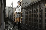 giantess collage city high_heels buildings asian uniform ponytails streets vehicles leaning_against_building white_blouse knee_socks mini_skirt