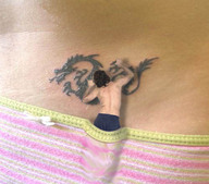 drawing collage panties shrunken_man tattoo panty_entrapment lower_back