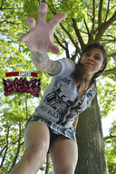 clothed brunette low_angle hand reaching looking_down canadian_giantess photograph thighs outdoors tattoo point_of_view trees looking_at_viewer perspective megz_toxik