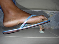 collage feet toes shrunken_man under_foot flip_flops floor raised_foot source_needed imminent_crush kimberly