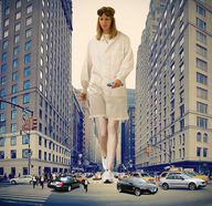 giantess collage blonde handheld buildings running looking_down vehicles goggles lab_coat
