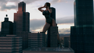 breasts giantess city mega large_breasts clothed cleavage brunette skyline leaning_against_building sunset unitard digital_render