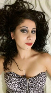 collage black_hair cleavage lying_down shrunken_man looking_at_viewer between_breasts