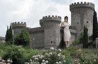 breasts giantess collage mega brunette castle dress leaning_against_building outdoors looking_at_viewer zed782
