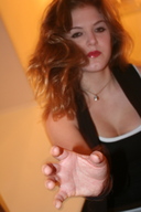 hand reaching kitty photograph grabbing point_of_view