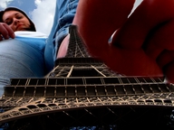 giantess collage mega barefoot jeans smiling short_hair looking_down point_of_view eiffel_tower imminent_crush