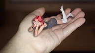 butt handheld socks red_hair dress lying_down medium_length_hair shrunken_woman point_of_view upset