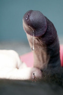 collage aroused giant penis pubic_hair shrunken_man looking_up precum