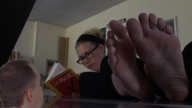 collage blonde barefoot glasses lying_down unaware shrunken_man point_of_view reading mcflyonthewall