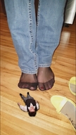 collage jeans lying_down nylons shrunken_man indoors discarded_shoes standing_up