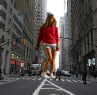 gentle giantess collage city blonde long_hair clothed buildings socks street shorts standing vehicles onlookers looking_up truck new_york_city sweatshirt