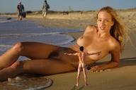 breasts nipples gentle collage nude blonde long_hair butt beach barefoot pubic_hair ocean lying_down shrunken_man goingdown