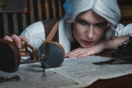 white_hair long_hair shrunken_man magnifying_glass newspaper digital_render the_witcher zboczony typewriter head_on_hands geralt ciri