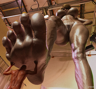 nude large_breasts barefoot pubic_hair soles brunette short_hair muscles shrunken_man looking_down indoors under_foot holding_up imminent_crush hand_on_hips digital_render veiny