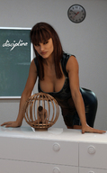 nude large_breasts long_hair cleavage brunette bending_over shrunken_man looking_down cage trapped indoors looking_away digital_render low_cut