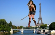 giantess earth city space black_hair long_hair sword skirt boots outdoors wonder_woman eiffel_tower stars tiara shield
