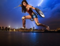 giantess collage earth city space black_hair long_hair sword skirt boots outdoors wonder_woman stars tiara shield