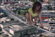 collage destruction barefoot brunette smiling foot_crush short_shorts medium_length_hair looking_down grabbing crouching looking_at_tiny jake774
