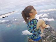 giantess collage mega brunette asian sitting sunglasses looking_up outdoors flip_flops airraid