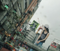 giantess collage city jeans asian laughing outdoors looking_back top baseball_cap airraid
