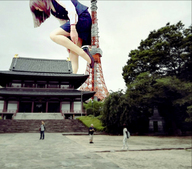 giantess collage city long_hair skirt high_heels brunette asian bending_over outdoors office_lady radio_tower airraid