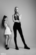 size_difference blonde long_hair clothed high_heels brunette ponytail dress mini_giantess amazon pants top looking_at_viewer ariana_grande nike_thea