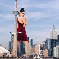giantess collage city mega black_hair buildings dress jets tower sky looking_at_viewer toronto cn_tower inanna_sarkis