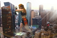 giantess collage city long_hair red_hair ponytail shorts outdoors sports_bra boxing_gloves giulio_10