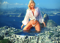 bikini drawing city mega blonde color large_breasts long_hair beach cleavage ocean buildings wet kneeling looking_down mountains giantesses shirt wading see_through_clothing