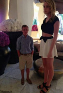 gentle blonde long_hair clothed skirt high_heels amazon standing size_comparison shirt looking_at_viewer lowerrider