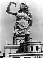 giantess collage city monochrome long_hair destruction handheld buildings smiling dangle towering edison