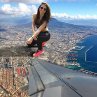 giantess collage city mega brunette smiling kneeling sunglasses aerial_view looking_at_viewer giulio_10