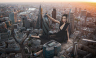 breasts giantess collage city mega destruction cleavage angry dress sitting london medium_length_hair lipstick looking_at_viewer docop emilia_clarke hand_on_building gherkin