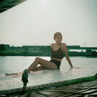 gentle giantess collage black_hair skirt water asian shorts top looking_away wading onlooker kyojingirls