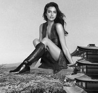 giantess collage monochrome long_hair clothed brunette dress boots sitting looking_at_viewer china irina_shayk