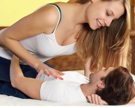 gentle collage blonde long_hair clothed cleavage jeans smiling lying_down amazon manicure top embrace innerspaceexplorer