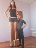 gentle collage black_hair long_hair high_heels smiling amazon shorts standing size_comparison top looking_at_viewer lowerrider