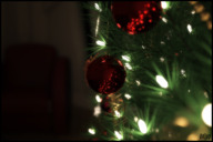 barefoot climbing shrunken_man close_up naked_man lights christmas_tree digital_render starkadhr ornament