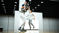black_hair large_breasts clothed cleavage short_hair mini_giantess basketball reaching jumping indoors digital_render
